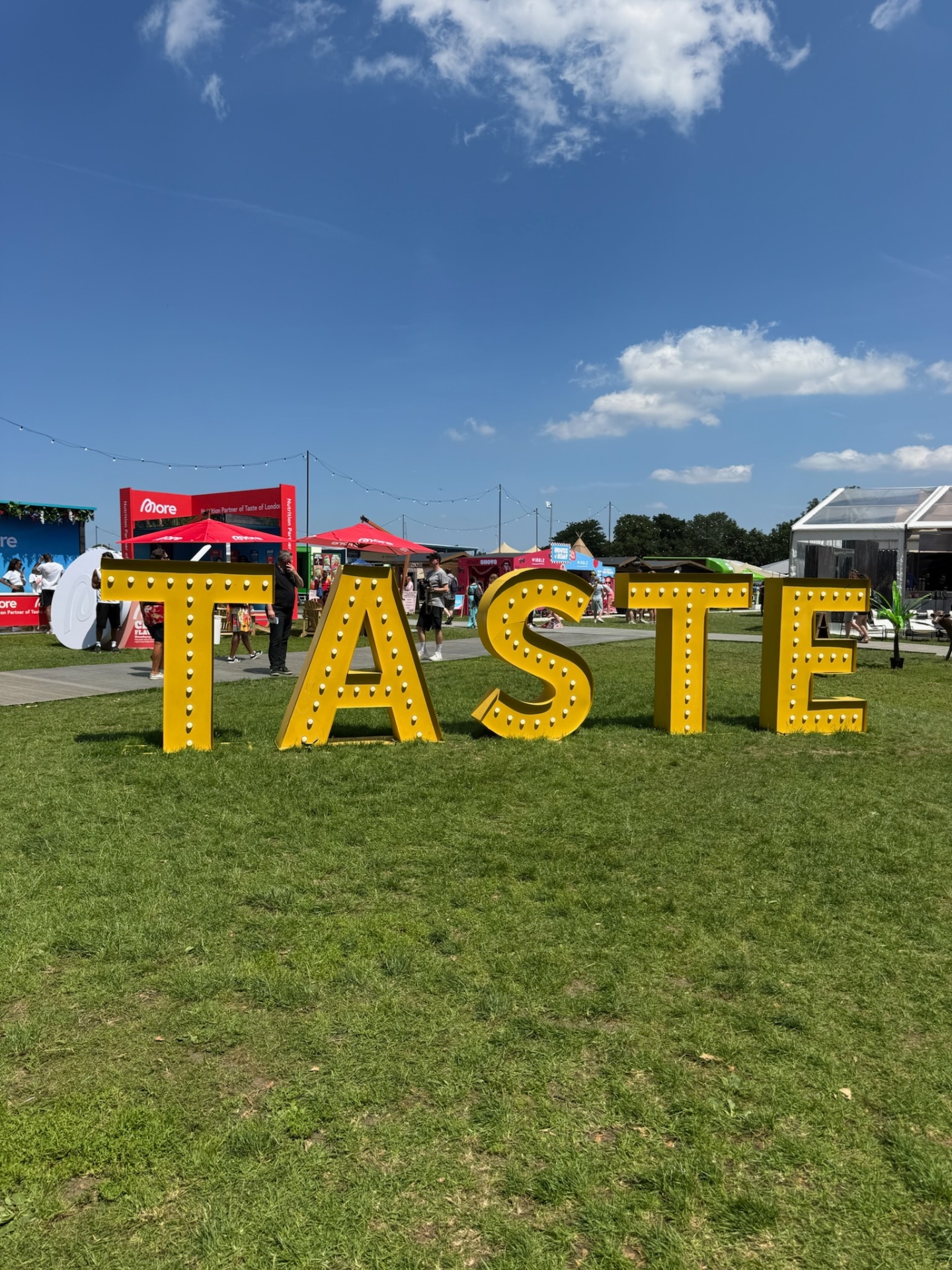 Large TASTE sign at Taste of London in Regent's Park